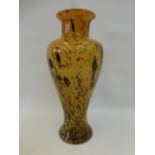 A decorative Murano style flecked glass vase.