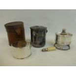 A good quality silver plated travel stove with an ivory screw in handle, set within a brown