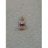 A pink sapphire and diamond 18ct gold dress ring, size N.