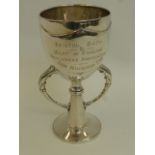 A twin handled silver trophy with inscription Bristol, Bath and West of England Pekingese