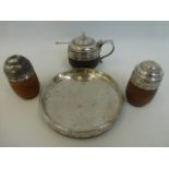 A four piece silver mounted wooden condiment set, maker - John Charles Lowe, London 1938.