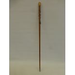 A 19th Century military walking stick/cane with precious yellow metal knop, decorated with crossed