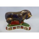 A Royal Crown Derby bull paperweight 13.5cm high, gold stopper.