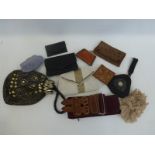 An assortment of lady's purses including an Art Nouveau silk lined purse with internal mirror.