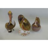 A Royal Crown Derby kingfisher, pelican and cockerel, all silver stoppers.