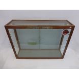 A Hornby-Dublo shop counter display cabinet with rear sliding doors, 32 x 24 x 9".