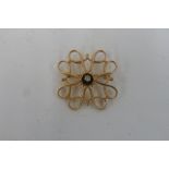 A 9ct gold and diamond brooch