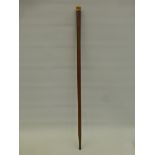A 19th Century walking cane with ivory knop inscribed Uncle Throwers.
