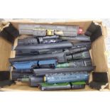 A box of assorted model steam locomotives with tenders, mounted on a single track base with relevant