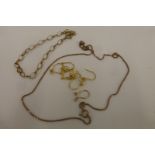 A 9ct gold chain, a 9ct gold bracelet and a quantity of 9ct gold earring hoops, weight 5.3g.