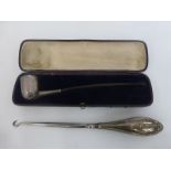 A cased silver pipe fitted in a blue lined case, maker - Henry Hobson & Son, London 1934, together