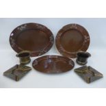 Two oval Art Nouveau copper trays stamped Beldray, a similar Art Nouveau circular copper tray and