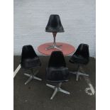 Four Arkana chairs plus a red topped circular table.