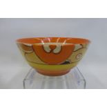 A Clarice Cliff Newport Pottery Bizarre Sliced Fruit bowl decorated with sliced oranges and lemons.