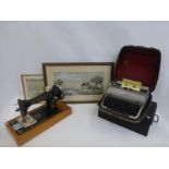 A 1950s Remington typewriter, a Singer sewing machine, a strongbox and a carriage lantern; also a