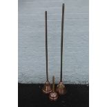 Three assorted 19th century copper wash dollies including a "The SWIFTSURE" and "ECLIPSE".