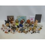An extensive wooden, metal, ceramic and glass pig collection including volumes relating to pigs.