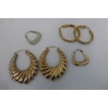 Three pairs of 9ct gold earrings including two pairs of hooped CZ inlaid earrings.