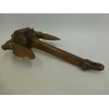 A brass EYNON'S patent miniature Gripwell anchor in excellent condition (as displayed in the