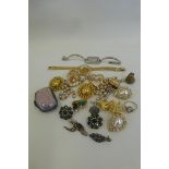 An assortment of costume jewellery including a pair of Christian Dior earrings.