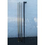 Three assorted snooker cues, a Champion snooker cue Joe Davis World Snooker Record 147 , a Horace