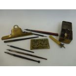 An assortment of 19th Century writing/stationery accessories including ink pens, brass stamp box