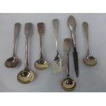 An assortment of silver sauce/mustard spoons including German.