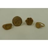 Four assorted 9ct gold rings all inset with various coinage, 14.2g.