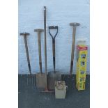 An assortment of wooden handled garden tools, a boxed puzzle roll and a Valor petrol can.