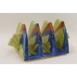 A Clarice Cliff Newport Pottery Delecia Bizarre three section toast rack (in very good condition).