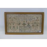 A 19th Century framed and glazed sampler by Sarah Bacon, born January 3 1815.