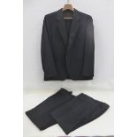 A Moss Bross of Covent Garden wool dinner jacket and trousers with additional pair of non-labelled