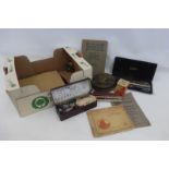 A box of mixed collectables including a Skala geometry set, a Reeves leather work set No. 1, a