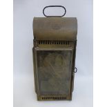 An EILLS & Company, Liverpool, brass carrying lantern with applied wall mounting bracket.