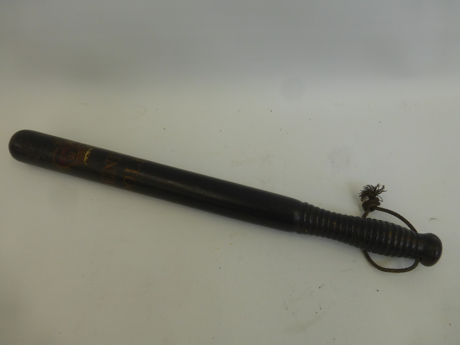 A 19th Century Denham Police (Thames Valley) truncheon with original paint work and decorated with a