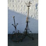 A metal telescopic oil lamp stand and a gas ceiling chandelier.