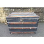 A 19th Century studded leather and wooden bound blanket chest.