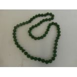 A beaded jade necklace.