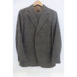 A tailored three piece gentleman's suit.