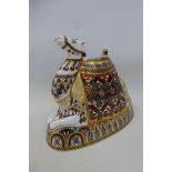 A Royal Crown Derby seated camel paperweight 17.5 cm high, gold stopper.