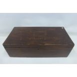 A stained walnut twin handled box with rising lid.