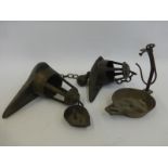 A 18th Century and later betty lamp whale oil grease lamp and one other small oil lamp, plus two