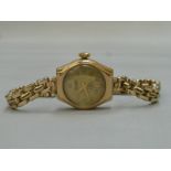 A lady's 9ct gold Everite wristwatch with subsidary seconds dial.