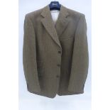 A tweed gentleman's jacket by Magee, a wool waistcoat and a pair of 36" trousers from Pakeman