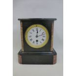 A late Victorian slate mantel clock with French movement.