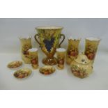 Nine pieces of Aynsley Orchard Gold pattern ceramics, comprising two pairs of vases, one other vase,