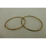 Two 9ct gold bangles, weight 6.8g.