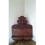 A Victorian chip carved fruitwood treen wall hanging shelf.