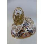 A Royal Crown Derby lion designed by Hugh Gibson 14.5cm high.