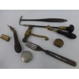 An assortment of 19th Century and later hand tools including an ebony sliding handled screw driver.
